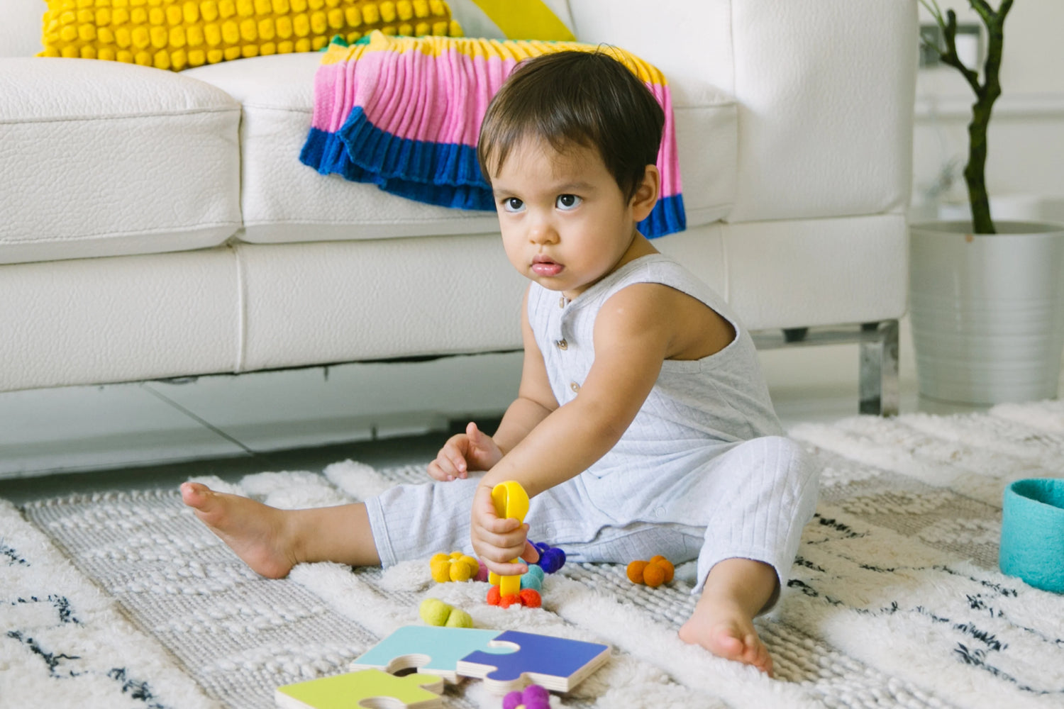 Parent calmly discussing with a toddler who is saying "no," highlighting a moment of understanding and patience.